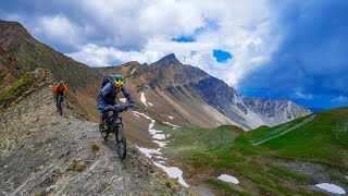 Traversing the Alps on a Mountain Bike  A Scenic Journey [upl. by Refannej659]