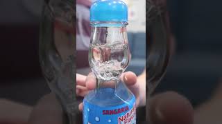 How to Open Ramune Soda Bottle  Cool Products from Japan [upl. by Aleakim]