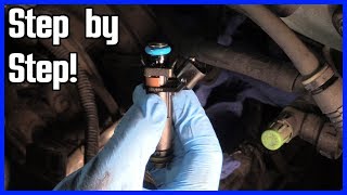 How to Replace a Fuel Injector Ford F150 20042008 [upl. by Asecnarf]