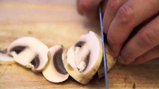 Knife Skills How To Slice Mushrooms [upl. by Htiekram]