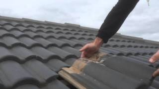 How to change a concrete roof tile [upl. by Krute]