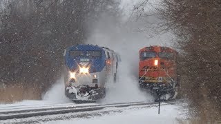 Slow BNSF Coal Train Gets Passed by Amtrak in Cloud of Snow [upl. by Latini]