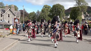 Massed Pipes and Drums march to the 2019 Braemar Gathering in Royal Deeside Aberdeenshire Scotland [upl. by Doownelg]