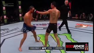 Max Holloway teaching Brian Ortega to block punches mid fight [upl. by Aehtna]