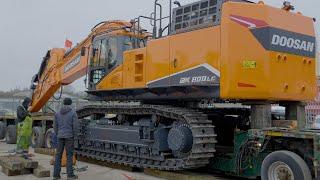 Moving New Doosan DX800 Excavator From Dealers Yard [upl. by Anerhs]