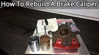 How To Rebuild A Front Brake Caliper  Complete Guide [upl. by Harat]