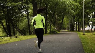 Woman Jogging Slow Motion Stock Video [upl. by Darsey]