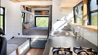 Spacious Shuttle Bus Conversion Built For Family Adventures  DIY Tiny House [upl. by Akeihsal820]